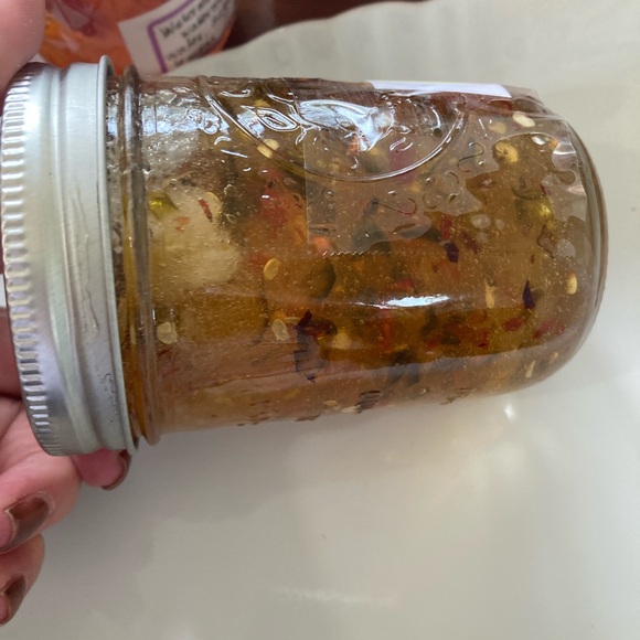 One half pint jar of hot pepper jelly from Yellow Flower Farm. Scrumptious. - Picture 4 of 5